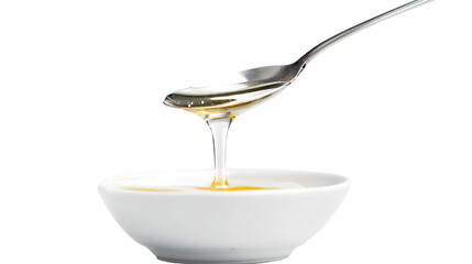 a spoon with liquid pouring out of it