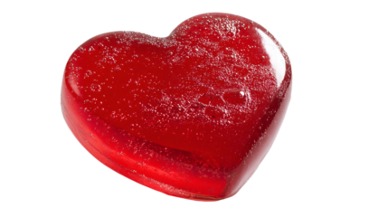 a red heart shaped candy on a white background