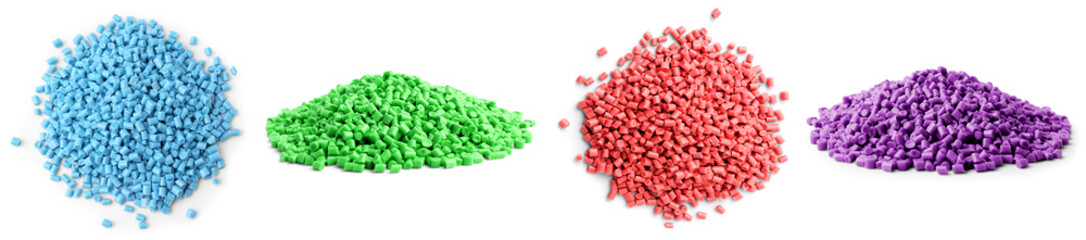 Plastic granules in different colors. Piles on white background, set