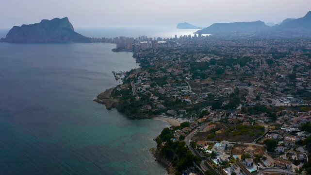 Aerial view of the little beach of Cala Fustera, Cala Llobella, Cala del Advocat in Benissa coast, Mediterranean Sea, Spain.