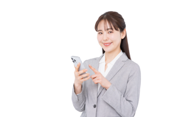 スマホを見るビジネスウーマン