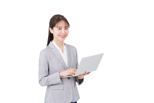 ノートパソコンを使うビジネスウーマン。
