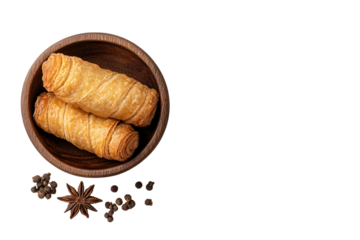 Golden Pastry Delight: A duo of flaky pastries nestled in a rustic wooden bowl, garnished with star anise and peppercorns, offering a tantalizing glimpse of culinary artistry.