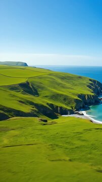 Aerial Seascape of Green Coastal Cliffs and Azure Blue Ocean