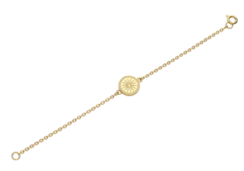 Delicate gold bracelet with a circular charm.
