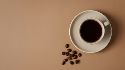 Obraz premium Top view of a white cup of black coffee with scattered coffee beans on a neutral background