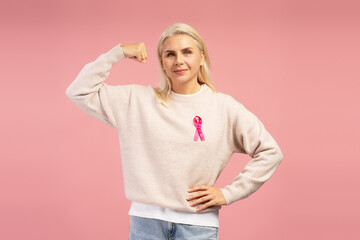 Woman showing strength and support for breast cancer awareness