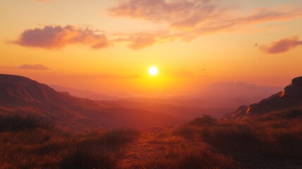 Obraz premium Golden sunset over a mountain range