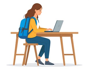 Young woman working on a laptop at a table