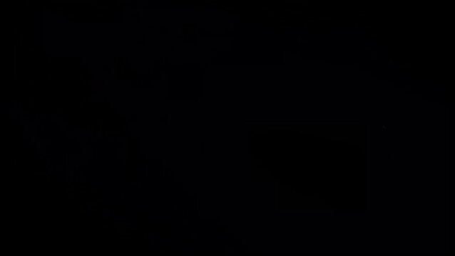 Realistic red lightning bolt on black background.