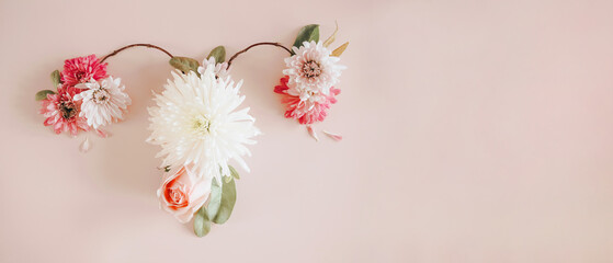 uterus shape made of flowers, female reproductive system , woman health, PCOS, gynecologic and cervix cancer concept

