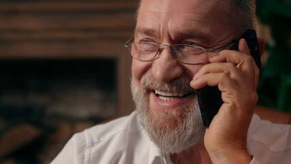 Confident successful old Caucasian man male mature takes off glasses looking at camera folded hands...