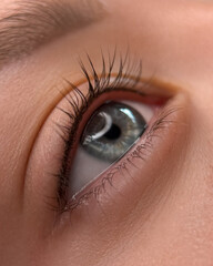 Obraz premium permanent makeup with eyeliner. Close-up of a beautician applying eyeliner to a customer, highlighting the precision and artistry of the makeup application process 