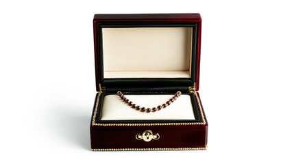 A luxury jewelry box open with a sparkling necklace inside, against a white background.