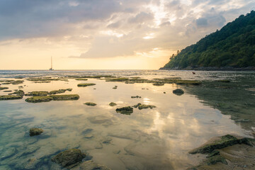 Scenic sunset seascape of Phuket&rsquo;s Rocky Beach during Low Tide