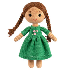 Fototapeta premium Handmade Doll in Green Dress Isolated On White Background: A charming handcrafted doll with braided hair and a delicate floral detail on a vibrant green dress, designed with soft.
