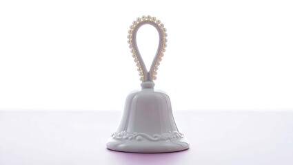 Elegant white bell with decorative handle and base
