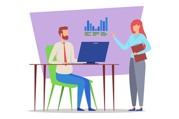 Man sitting at desk with computer while woman standing beside him, presenting data on graphics in professional discussion. People focused and engaged in conversation