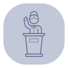 Person standing at podium, raising one hand in gesture suggesting speaking or addressing audience. Presentation or conference concept