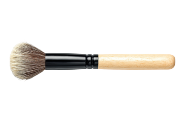 A makeup brush, angled, with a light beige/tan wooden handle and a black ferrule. The brush head is a fluffy, rounded puff, light gray/brown in color