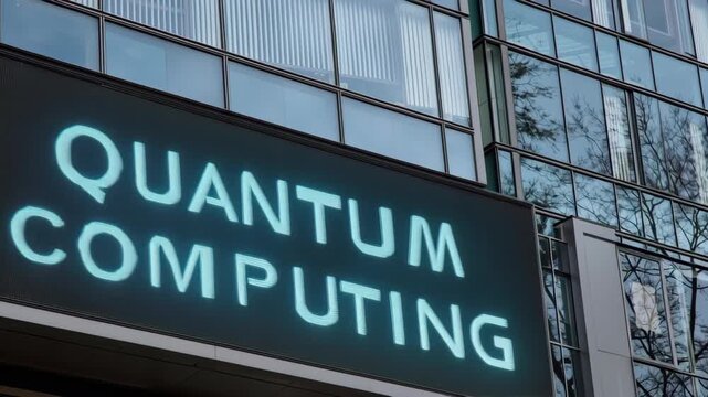 AI Quantum Computing Research and Development concept, Digital display of "Quantum Computing" on a modern building facade.