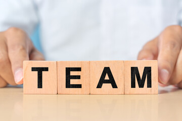 Concept of team on wooden blocks