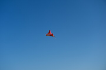 Colorful Kites Flying in Bright Blue Sky