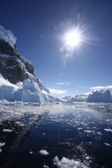 Antarctic landscape, bright sun, icy waters
