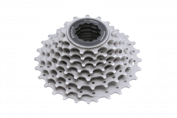 Close-up view of a silver bicycle cassette with multiple gears, highlighting its intricate design and metallic texture.