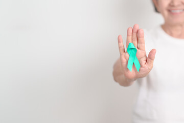 Elderly with Teal Ribbon for September Ovarian Cancer Awareness month, PCOS, January Cervical Cancer, April Sexual Assault, June PSTD, Post Traumatic Stress Disorder, May Tourette syndrome