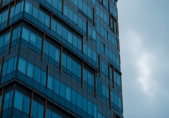 Obraz premium Modern architectural marvel showcasing sleek glass facades and a striking design, perfect for urban lifestyle and business themes.