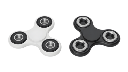 Modern white and black fidget spinners, offering stress relief and focus