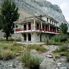 Abandoned Hotel in Mountain Valley.