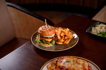 Burger with fries on a table