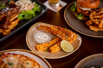 Barbecue corn ribs on table