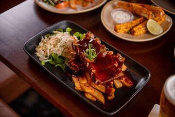 Barbecue Ribs With Sauce On Table