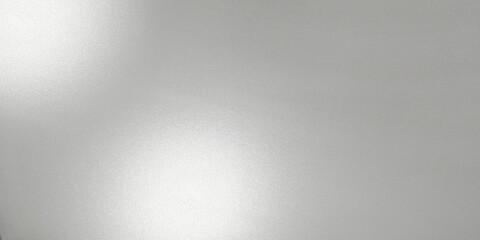 Close up, textured blurred frosted glass. Color is a light, cool gray with bright white highlights...