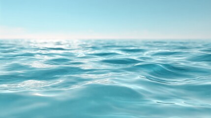 Naklejka premium The image is of a calm ocean with a blue sky in the background. The water is still and the sky is clear, creating a peaceful and serene atmosphere