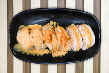 Top view of Japanese fresh salmon sushi with Japanese rice, focus selective