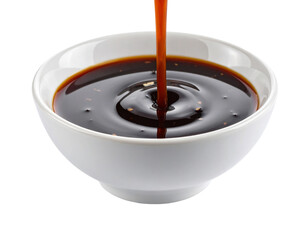 Oyster Sauce Pouring into White Bowl Isolated on White