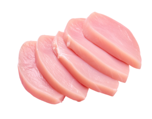 Freshly Sliced Chicken Breast on Pink Background