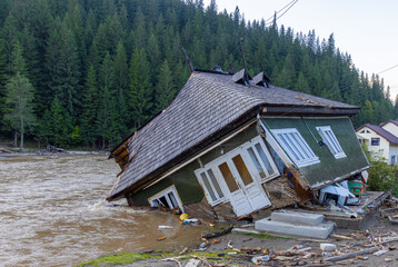 Flooded and destroyed house following the floods in Brosteni - Romania