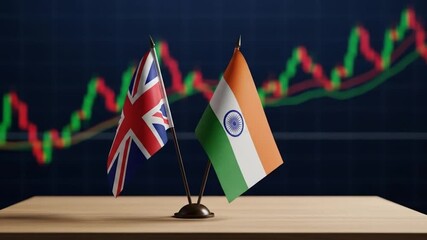 British and Indian flags symbolizing a strong economic partnership and bilateral trade with a rising stock market graph background.