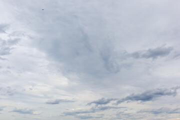 Overcast sky with scattered gray clouds