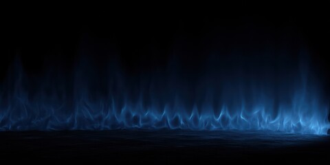Blue flames rise from a dark surface against a dark background featuring subtle motion and illumination