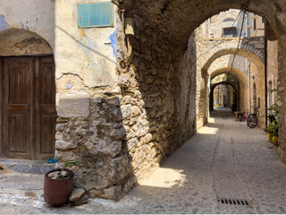 Narrow medieval alley in Mesta Village. Chios Island, Greece.