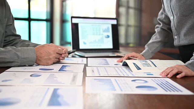 Business financial team meeting and present report data charts and graphs and analysis business statistic for financial planning management.	