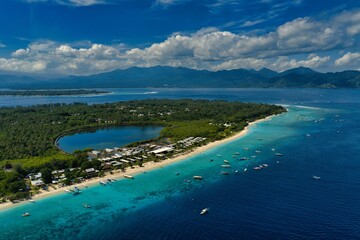 Aerial views of Gili Meno captured in May 2025. Crystal-clear waters, coral reefs, and tropical coastline from above — showcasing the island’s serene beauty and vibrant marine life.