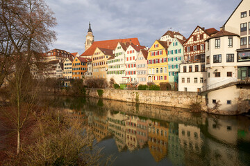 Historic German old town on the riverbank. Reflections of half-timbered houses in the water....