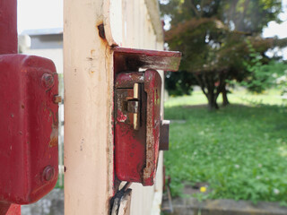 weathered iron gate lock